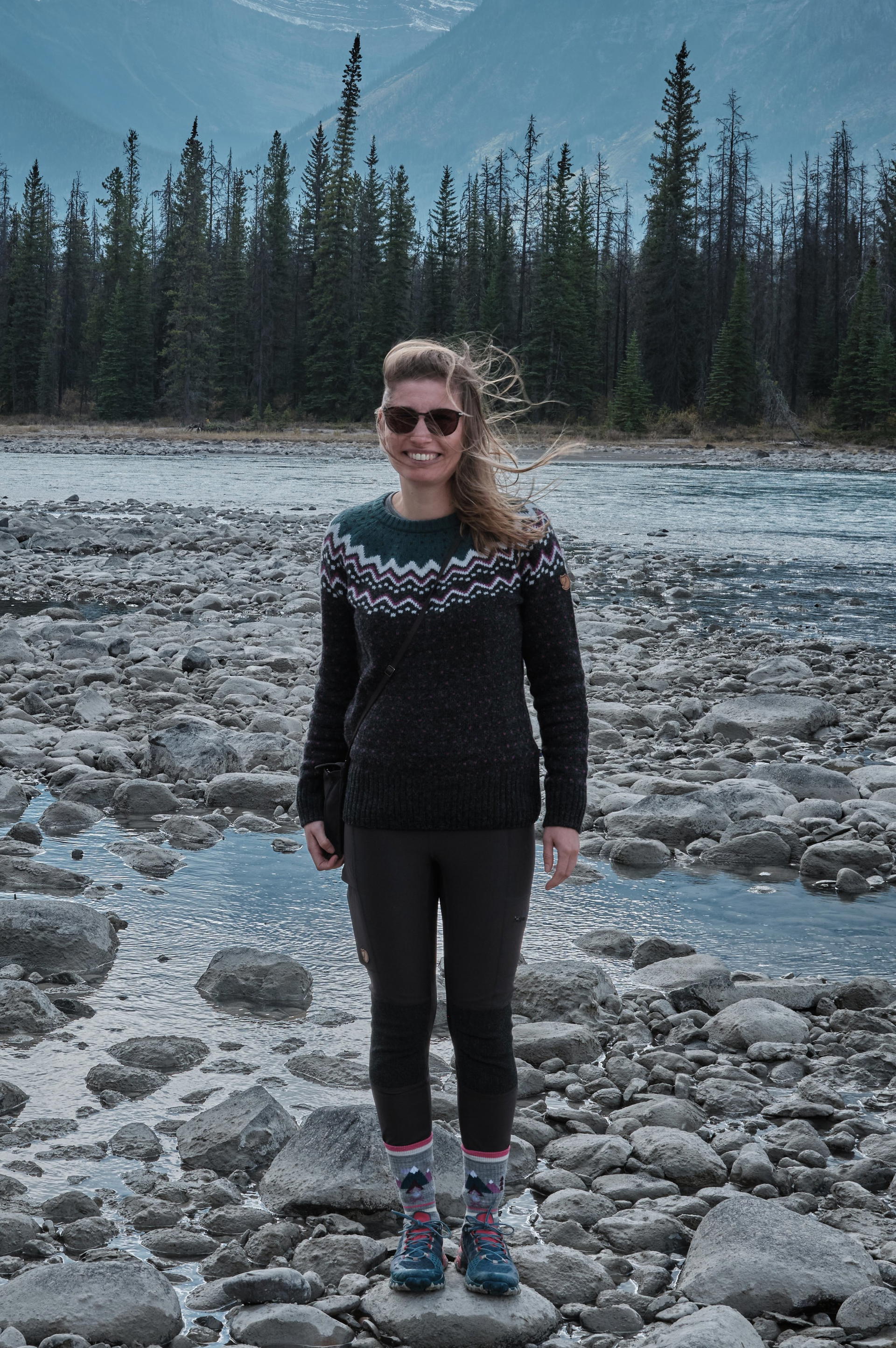 Kathrin on a riverbank in Canada