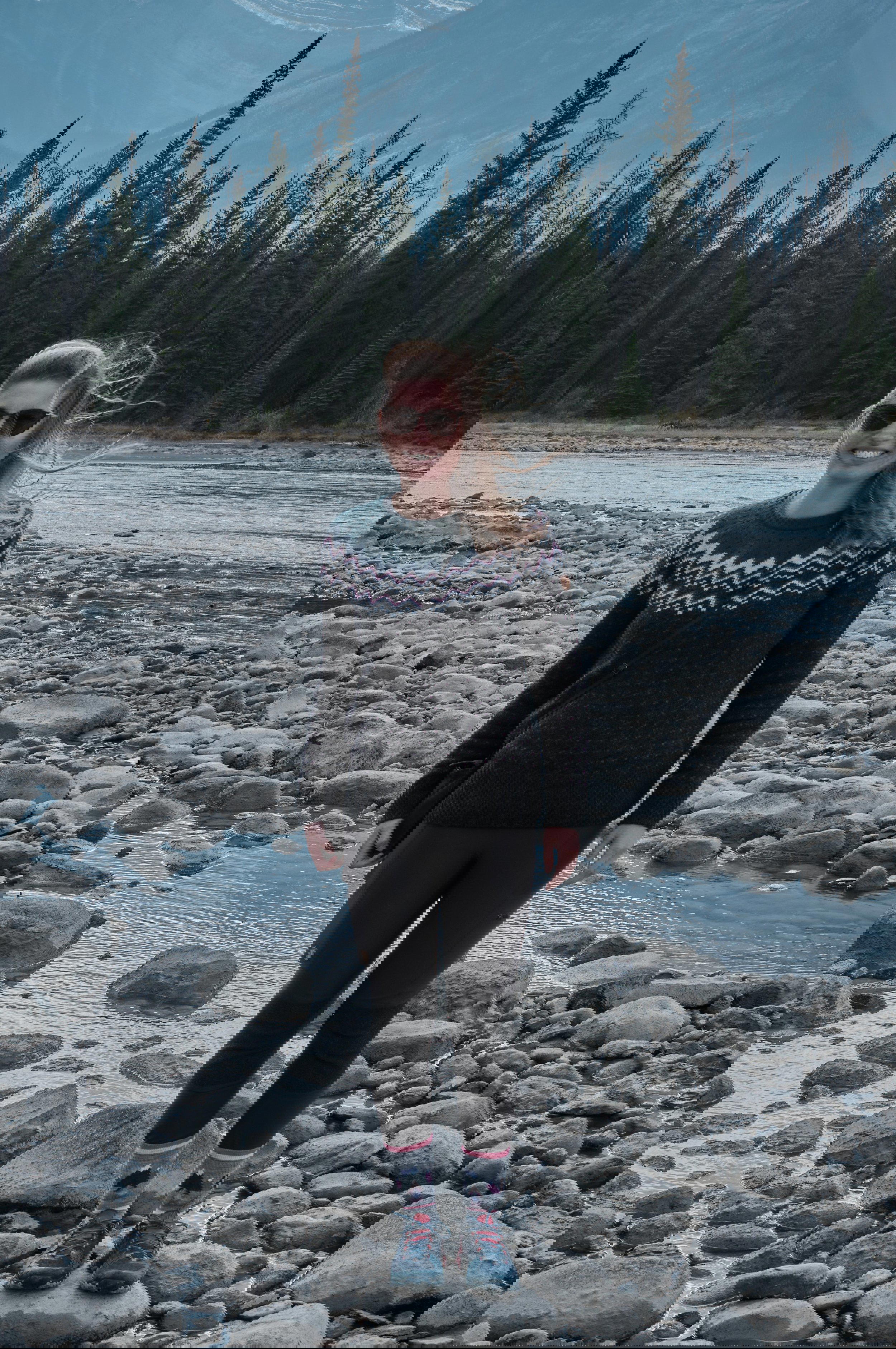 Kathrin on a riverbank in Canada