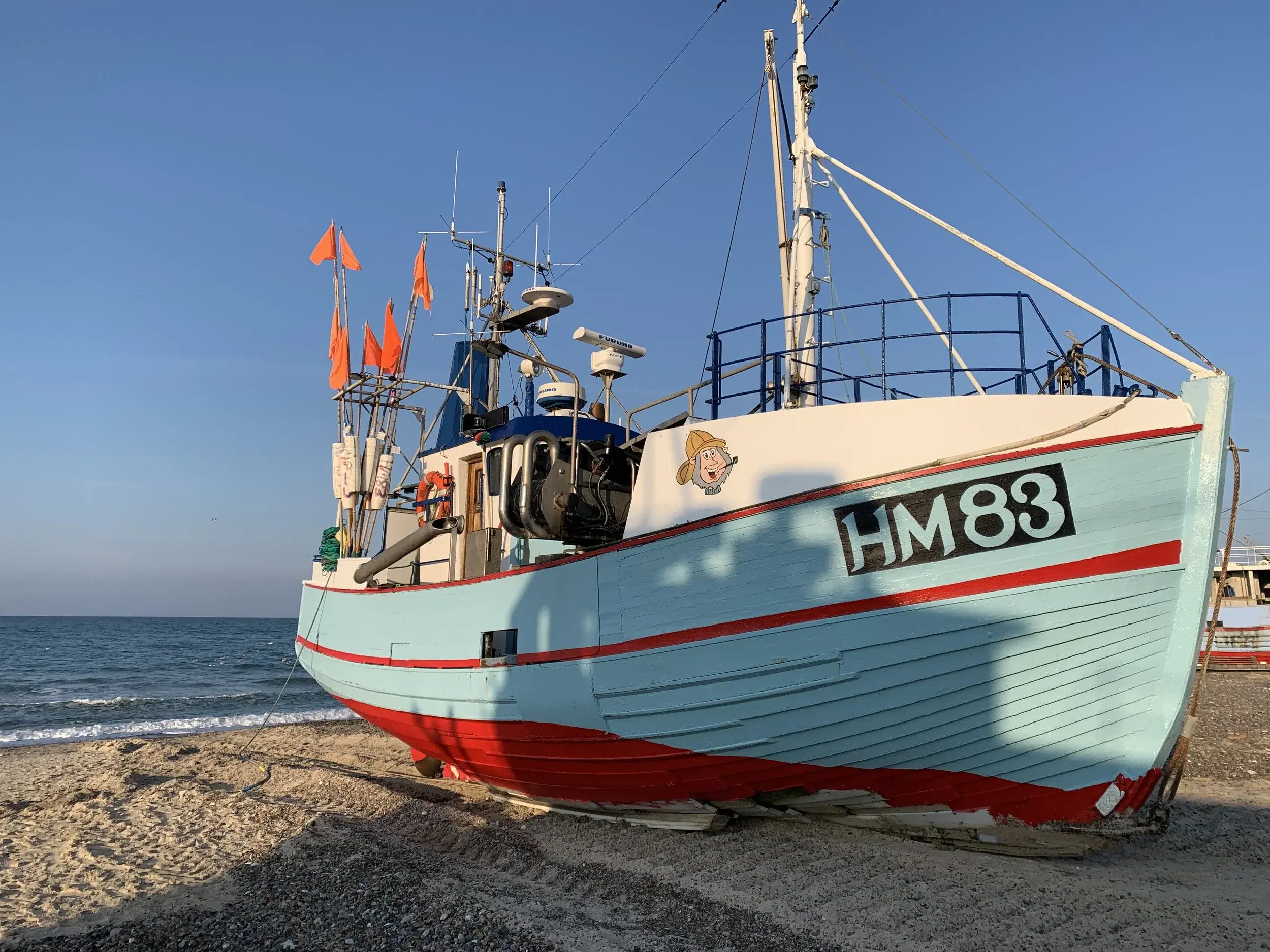 View of a boat on the beach in Lund Fjord.