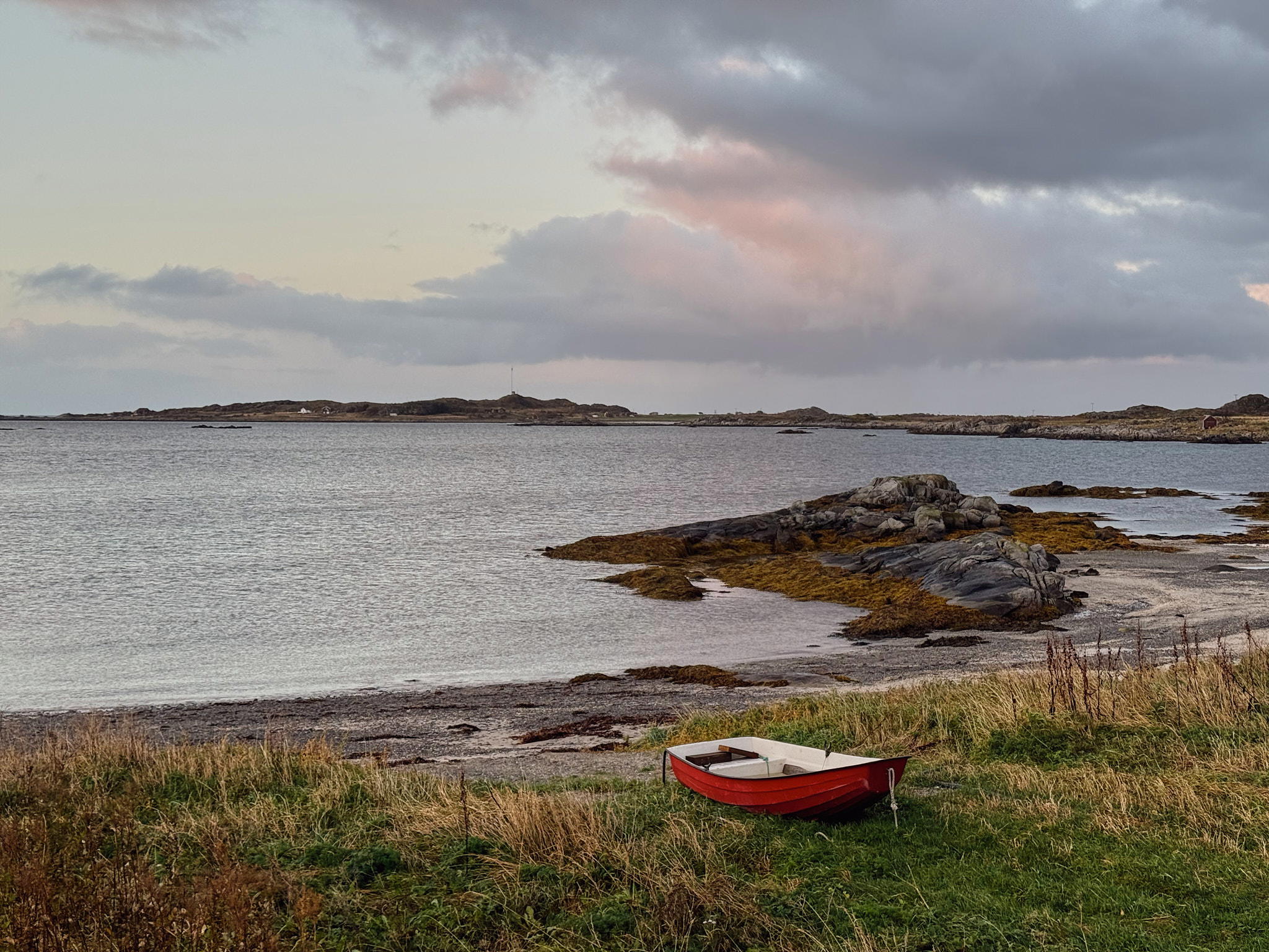 Red boat on the beach of Vestersand