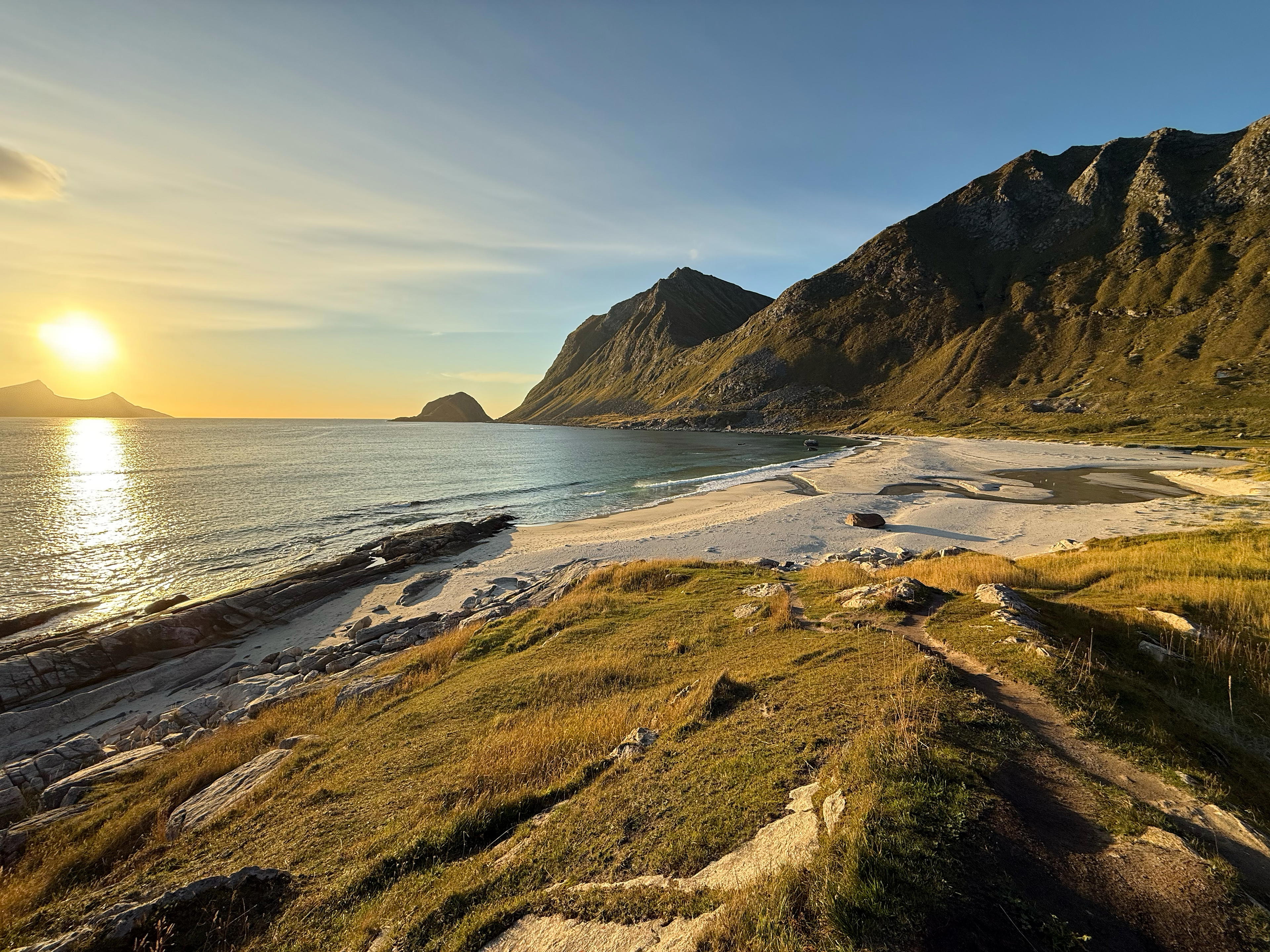 Image of Vik/Haukland beach in golden sunlight