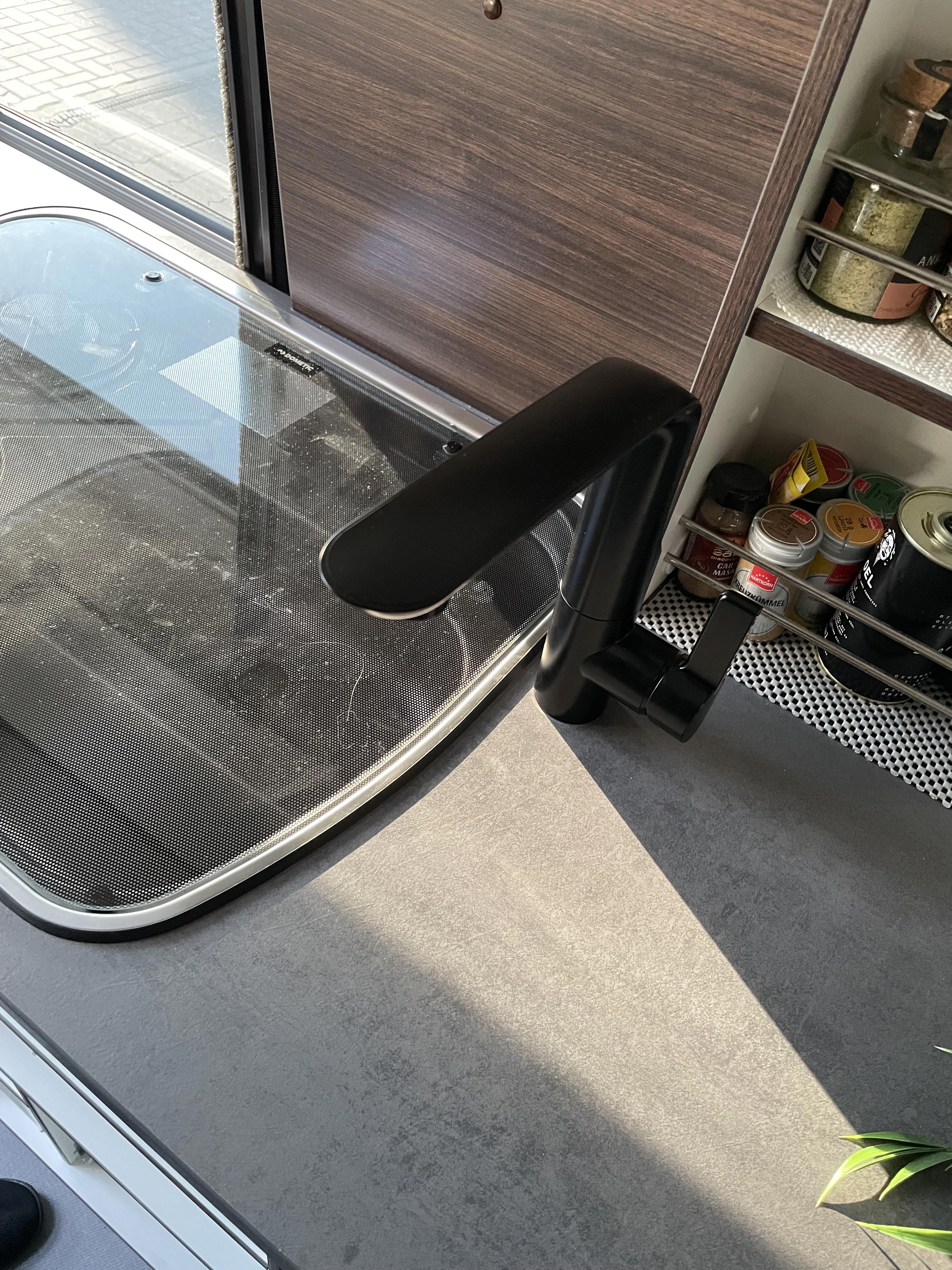 Image of a water tap installed in a van