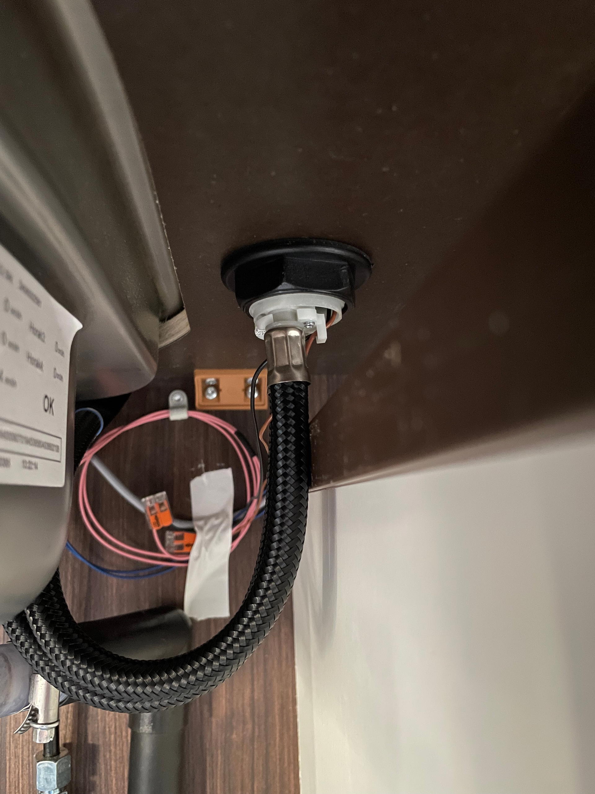 new tap under countertop.jpeg