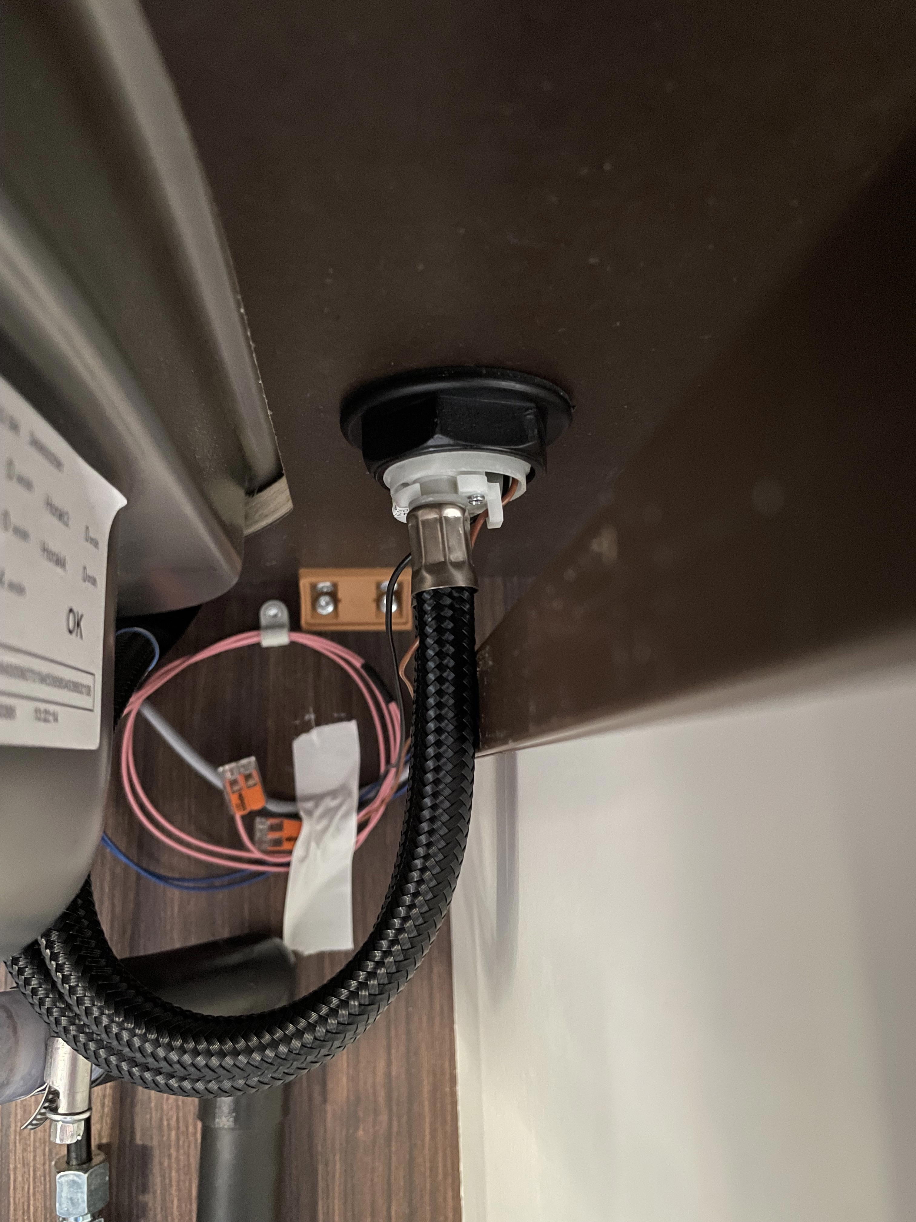 new tap under countertop.jpeg