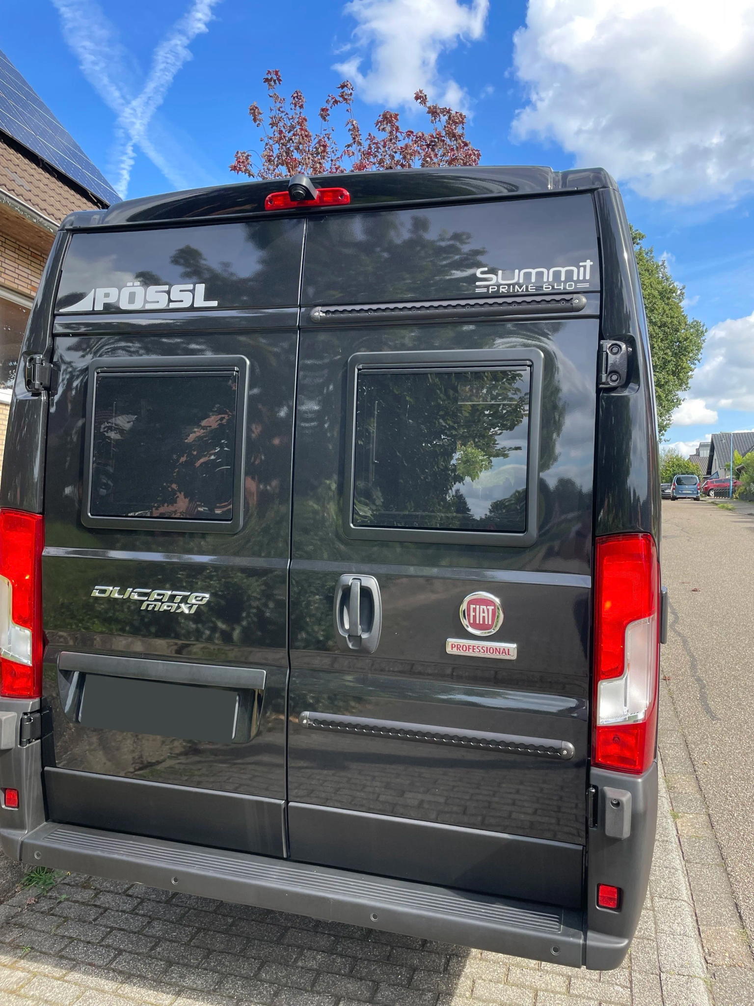 Bike carrier mounted on the back of our campervan Wilma